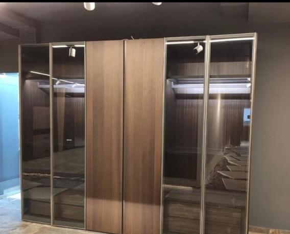 Walnut wardrobe with smoked glass mirrored doors